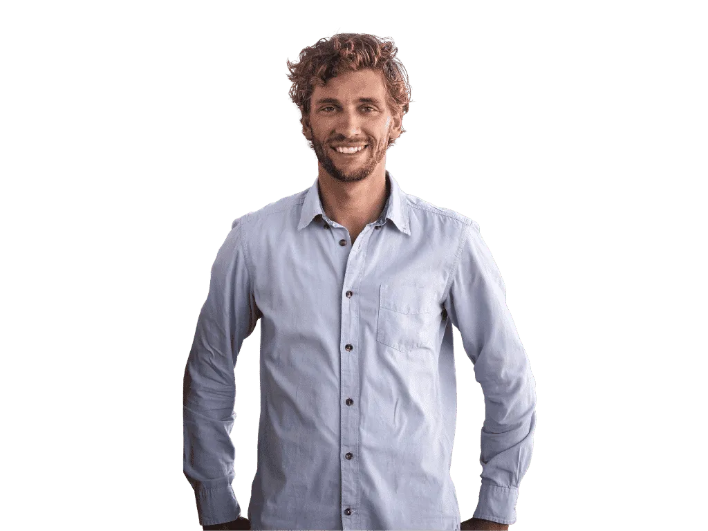 Professional standing in front of a light background